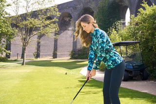 How to Style Trending Teal with Your Go-To Navy Golf Staples