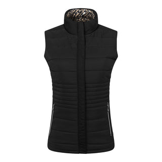 The Pure Golf Eve reversible ladies gilet for golf is insulated, winter-weight, patterned and reversible. It has been Insulated for warmth without being bulky. It has a unique animal print in wild truffle,  on one side and black on the other for versatility of wear. It has pockets on both sides and two-way zippers. The flattering quilting style and fit enhances your silhouette. The colors in this  this piece are Cappuccino,  Champagne and black.  