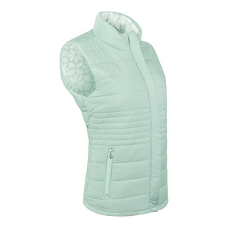 Frosted Sage Pure Golf Eve reversible ladies gilet for golf is insulated, winter-weight, patterned and reversible. It has been Insulated for warmth without being bulky. It has a unique frosted field, floral print  on one side and plain frosted sage on the other for versatility of wear. It has pockets on both sides and two-way zippers. The flattering quilting style and fit enhances your silhouette. 