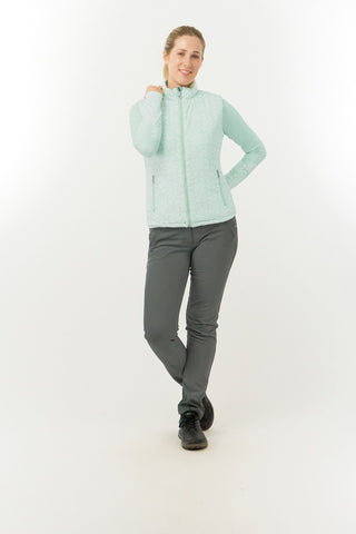 Frosted Sage Pure Golf Eve reversible ladies gilet for golf is insulated, winter-weight, patterned and reversible. It has been Insulated for warmth without being bulky. It has a unique frosted field, floral print  on one side and plain frosted sage on the other for versatility of wear. It has pockets on both sides and two-way zippers. The flattering quilting style and fit enhances your silhouette. 