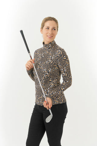 Pure Golf Arusha is a long-sleeved ladies winter weight golf top made from a super soft brushed fabric. It is two tone with a unique animal print in a soft cappuccino color with a high neckline.   A quick dry, made from UPF35, 4-way stretch, anti-crease fabric for ultimate comfort and fit. 