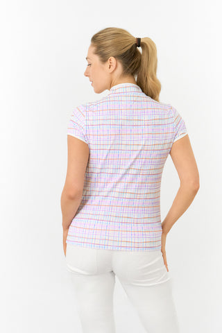 The model shot showcases the back of the Pure Golf Rise Pastel Score Cap Sleeve Ladies' Golf Polo Shirt, featuring refreshing pastel shades that evoke a springtime vibe. With a regular fit and 4-way stretch, it ensures a flattering shape for all body types. The mandarin collar adds an elegant touch. Crafted from 95% polyester and 5% spandex, it offers anti-crease, anti-static, and quick-dry properties, along with UPF 50+ sun protection. Paired with White Trust Capri's, it completes a stylish look.