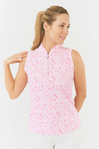 The Pure Golf Rise sleeveless ladies' golf polo shirt in the Soft Sakura design showcases a soft pink background adorned with a subtle pattern of lilac, pink, and white petals. Featuring a regular fit and 4-way stretch, it provides comfort and a flattering silhouette for all body types. The mandarin collar enhances its elegant appeal. Made from 95% polyester and 5% spandex, the shirt boasts anti-crease, anti-static, and quick-dry features and UPF 50+ sun protection. 