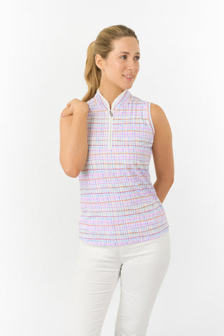 The Pure Golf Rise Pastel Score Sleeveless Ladies' Golf Polo Shirt modeled from the front, featuring soft, refreshing pastel shades that evoke a springtime feel. With a regular fit and 4-way stretch, it offers comfort and a flattering silhouette for all body types. The mandarin collar adds a touch of elegance. Made from 95% polyester and 5% spandex, this polo provides anti-crease, anti-static, and quick-dry properties, along with UPF 50+ sun protection. 