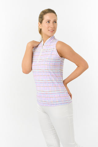 The Pure Golf Rise Pastel Score Sleeveless Ladies' Golf Polo Shirt, modeled from the front, features soft, refreshing pastel shades that evoke a springtime feel. With a regular fit and 4-way stretch, it provides comfort and a flattering silhouette for all body types. The mandarin collar adds a touch of elegance. Made from 95% polyester and 5% spandex, this polo offers anti-crease, anti-static, and quick-dry properties, along with UPF 50+ sun protection.