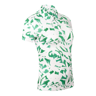 A product shot of the Pure Golf Amity, featuring the short sleeve ladies' golf polo shirt, taken from a slightly angled perspective. The top has a botanical print in emerald green and white. The polo shirt is a regular fit and has a 4 way stretch which ensures it is comfortable and flattering for all body types. It boasts a traditional collar for a classic and stylish look. The polo shirt is anti-crease, anti-static and quick dry with UPF 50+ which is 95% Polyester and 5% Spandex. 