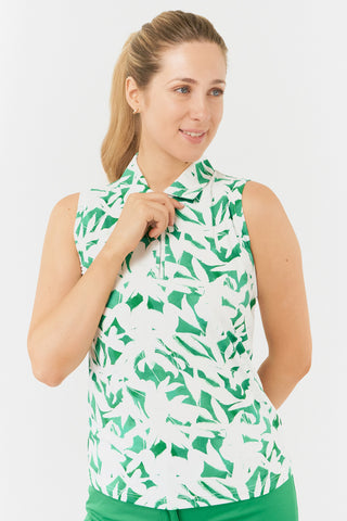 The front half shot of the Pure Golf Amity model showcases the sleeveless ladies' golf polo shirt with a botanical print in emerald green and white. Designed with a regular fit, it features a 4-way stretch for comfort and a flattering shape on all body types. The polo is styled with a traditional collar for a classic, elegant look. Made from 95% Polyester and 5% Spandex, the fabric is anti-crease, anti-static, quick-drying, and offers UPF 50+ sun protection. 