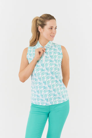 A front model shot of the Pure Golf Amity Sleeveless Ladies' Golf Polo Shirt in Floating Palms White, featuring a bold all-over botanical print in Ocean Colour on a crisp white background. This regular-fit polo offers 4-way stretch for a flattering fit on all body types. With its traditional collar, it embodies a classic look. The shirt is designed to be anti-crease, anti-static, and quick-drying, while providing UPF 50+ sun protection. Made from a blend of 95% Polyester and 5% Spandex.