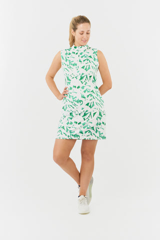 The Pure Golf model shot of the Wild Peony Emerald Miley Sleeveless dress showcases our botanical print. Made from 4-way stretch fabric for enhanced flexibility and unrestricted movement, while ensuring a flattering fit for all body types and includes detachable shorts for extra versatility and coverage. The mock neck collar adds a sleek, modern touch. Designed to be anti-crease, anti-static, and quick-drying, this dress offers UPF 50+ protection. It is composed of 95% Polyester and 5% Spandex.