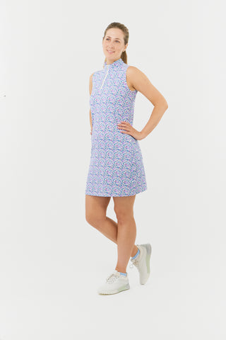 The Pure Golf model shot of the Miley Sleeveless dress features our “Over Eighteen” print of cocktail motifs in a subtle scale and a mixture of blues, lilac and pinks. Made in 4-way stretch material for maximum flexibility and unrestricted movement with detachable shorts for versatility and coverage. The mock neck collar offers a sleek, modern look and is a flattering fit on all body types. Designed to be anti-crease, anti-static, and quick drying. It provides UPF 50+, 95% Polyester and 5% Spandex.