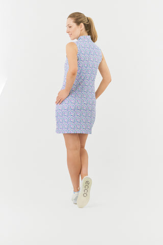 The Pure Golf model shot of the Miley Sleeveless dress features our “Over Eighteen” print of cocktail motifs in a subtle scale and a mixture of blues, lilac and pinks from the back. Made in 4-way stretch material for maximum flexibility and unrestricted movement with detachable shorts for versatility and coverage. The mock neck collar offers a sleek look and is a flattering fit on all body types. Designed to be anti-crease, anti-static, and quick drying. It provides UPF 50+, 95% Polyester and 5% Spandex.