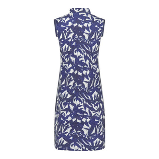 The Pure Golf product front shot of the Heather Sleeveless dress features a botanical print in navy and white and a flattering navy side panel. Made in 4-way stretch material for maximum flexibility and unrestricted movement with detachable shorts for versatility and coverage. The mock neck collar offers a sleek, modern look and is a flattering fit on all body types. Designed to be anti-crease, anti-static, and quick-drying, it also provides UPF 50+ protection. Made from 95% Polyester and 5% Spandex. 