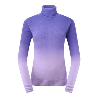 This is a front facing product shot of the Simone Lined Quarter Zip ladies' golf Jumper by Pure Golf. It is an extra warm, soft knitted roll neck. Simone is true-to-size fit, with ribbed cuffs and hem. It has an inside lining in the body and arms. It has an ombre knit from deep purple at the top fading to lilac.