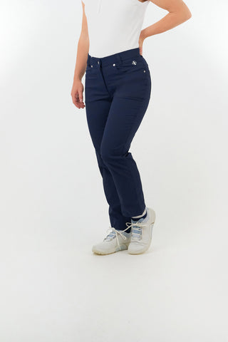 Navy Ladies golf trousers made from flexible lightweight 4 way stretch material.  Featuring a zip and button fastening with five belt loops, a regular fit with anti-crease and anti-static properties. These women's golf trousers have two open pockets to the front and back. Size 8 to 20.