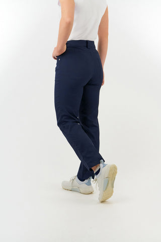 Navy Ladies golf trousers made from flexible lightweight 4 way stretch material.  Featuring a zip and button fastening with five belt loops, a regular fit with anti-crease and anti-static properties. These women's golf trousers have two open pockets to the front and back. Size 8 to 20.